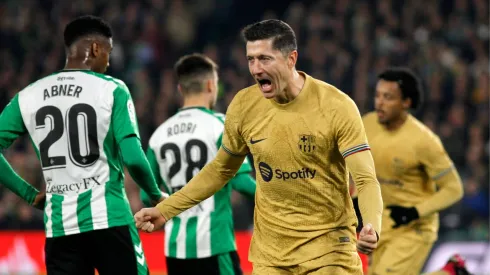 Barcelona bounces Betis to go eight points clear over Real