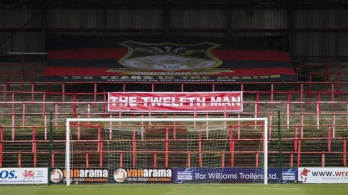 Wrexham reveals Kop delays as construction company goes bust