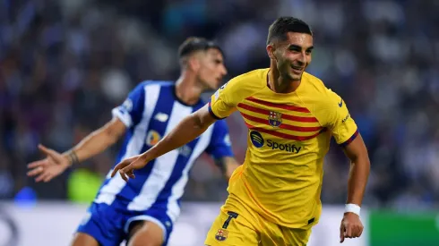 Barcelona grinds out win at Porto in Champions League