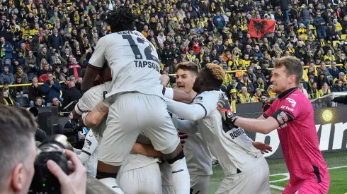 Last ditch goal keeps Leverkusen unbeaten run at Dortmund