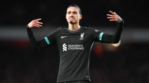 Liverpool sink to second after draw with Arsenal