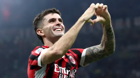 Christian Pulisic of AC Milan celebrates scoring his team's third goal during the Serie A match between AC Milan and Lecce at Stadio Giuseppe Meazza on September 27, 2024 in Milan, Italy.