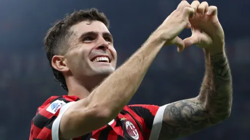 Christian Pulisic of AC Milan celebrates scoring his team's third goal during the Serie A match between AC Milan and US Lecce at Stadio Giuseppe Meazza on September 27, 2024 in Milan, Italy.