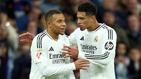 Kylian Mbappe and Jude Bellingham of Real Madrid interact during the LaLiga match between Real Madrid CF and FC Barcelona at Estadio Santiago Bernabeu on October 26, 2024 in Madrid, Spain.