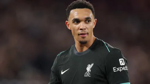 Trent Alexander-Arnold of Liverpool looks on during the Premier League match between West Ham United FC and Liverpool FC at London Stadium on December 29, 2024 in London, England.