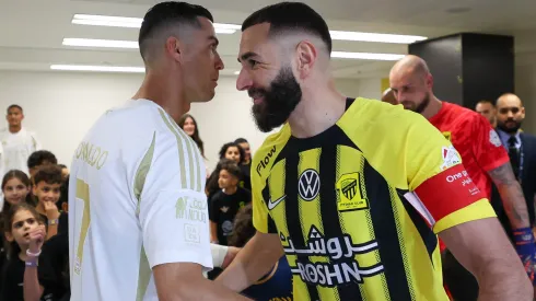 Cristiano Ronaldo of Al Nassr and Karim Benzema of Al Ittihad talk prior the Saudi Pro League match between Al-Ittihad v Al-Nassr at King Abdullah Sports City on December 6, 2024 in Jeddah, Saudi Arabia.