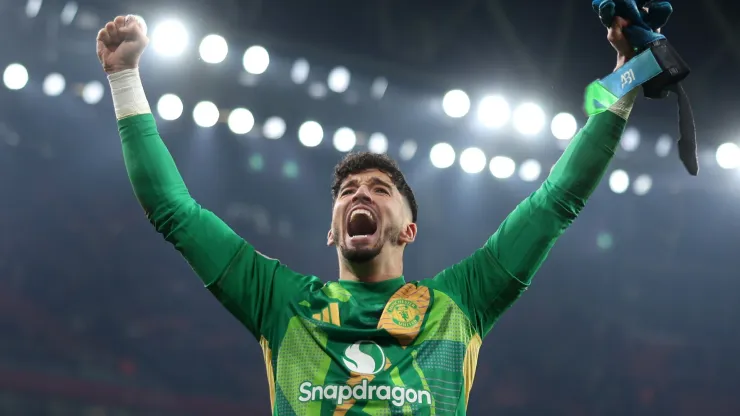 Altay Bayindir of Manchester United celebrates victory in the penalty shoot out after the Emirates FA Cup Third Round match between Arsenal and Manchester United at Emirates Stadium on January 12, 2025 in London, England
