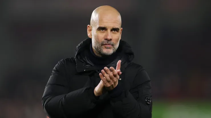 Pep Guardiola, Manager of Manchester City, applauds the fans at full-time following the team's draw following the Premier League match between Brentford FC and Manchester City FC at Gtech Community Stadium on January 14, 2025 in Brentford, England.