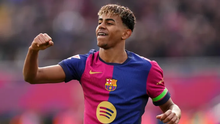 Lamine Yamal of FC Barcelona celebrates after Robert Lewandowski (not pictured) scores his team's first goal during the LaLiga match between FC Barcelona and Deportivo Alaves at Estadi Olimpic Lluis Companys on February 02, 2025 in Barcelona, Spain.