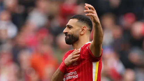 Mohamed Salah of Liverpool celebrates scoring his team's third goal during the Premier League match between Liverpool FC and Southampton FC at Anfield on March 08, 2025 in Liverpool, England.