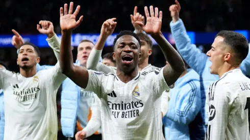 Vinicius Junior of Real Madrid celebrates victory after defeating Atletico de Madrid in the penalty shootout during the UEFA Champions League 2024/25 Round of 16 second leg match between Atletico de Madrid and Real Madrid C.F. at Estadio Metropolitano on March 12, 2025 in Madrid, Spain.