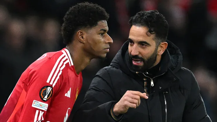 Ruben Amorim, Head Coach of Manchester United, speaks to Marcus Rashford of Manchester United as he prepares to enter the pitch as a substitute during the UEFA Europa League 2024/25 League Phase MD5 match between Manchester United and FK Bodo/Glimt at Old Trafford on November 28, 2024 in Manchester, England.