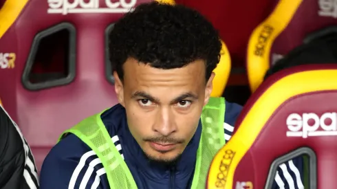 Dele Alli of Como looks on from the bench during the Serie A match between AS Roma and Como at Stadio Olimpico on March 02, 2025 in Rome, Italy.