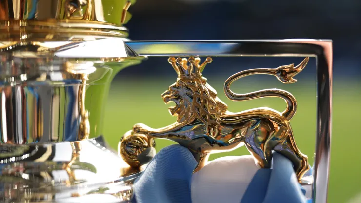 A detailed view of the Premier League Trophy as it is displayed inside the stadium.