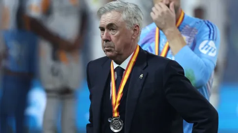 Carlo Ancelotti, Head Coach of Real Madrid, looks on with his Supercopa de Espana runners up medal during the trophy presentation after the Spanish Super Cup Final between Real Madrid and FC Barcelona at King Abdullah Sports City on January 12, 2025 in Jeddah, Saudi Arabia.