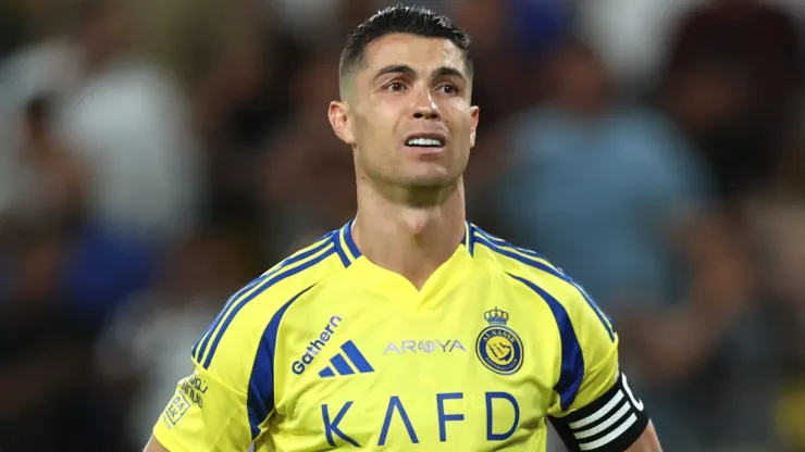 Cristiano Ronaldo of Al Nassr reacts after Karim Benzema of Al-Ittihad (not pictured) scores his team's first goal during the Saudi Pro League match between Al Nassr and Al Ittihad at Al-Awwal Park on May 07, 2025 in Riyadh, Saudi Arabia.