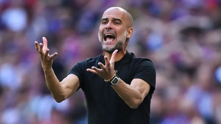 Pep Guardiola, Manager of Manchester City, reacts during the Emirates FA Cup Final match between Crystal Palace and Manchester City at Wembley Stadium on May 17, 2025 in London, England.