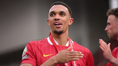 Trent Alexander-Arnold of Liverpool, celebrates after his final appearance for Liverpool as Liverpool are crowned the Champions of the Premier League for the 2024/25 Season, following the Premier League match between Liverpool FC and Crystal Palace FC at Anfield on May 25, 2025 in Liverpool, England.