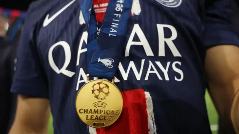 A detailed view of the UEFA Champions League winners medal worn by Achraf Hakimi of Paris Saint-Germain.