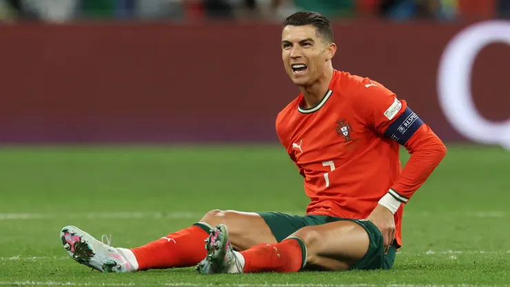 Cristiano Ronaldo of Portugal reacts following an injury during the UEFA Nations League 2025 final match between Portugal and Spain at Munich Football Arena on June 08, 2025 in Munich, Germany.