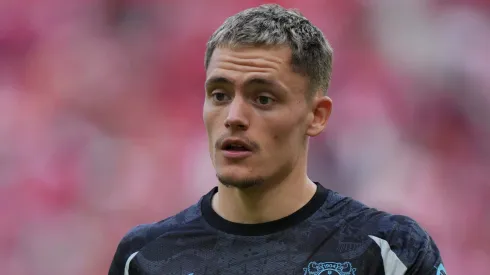 Florian Wirtz of Bayer 04 Leverkusen looks on during the Bundesliga match between 1. FSV Mainz 05 and Bayer 04 Leverkusen at MEWA Arena on May 17, 2025 in Mainz, Germany.
