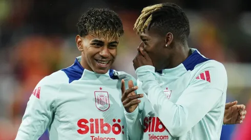 Lamine Yamal and Nico Williams of Spain warm up together prior to the UEFA Nations League Quarterfinal Leg Two match between Spain and Netherlands at Mestalla Stadium on March 23, 2025 in Valencia, Spain.