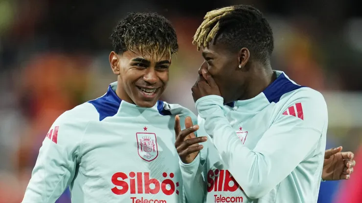 Lamine Yamal and Nico Williams of Spain warm up together prior to the UEFA Nations League Quarterfinal Leg Two match between Spain and Netherlands at Mestalla Stadium on March 23, 2025 in Valencia, Spain.