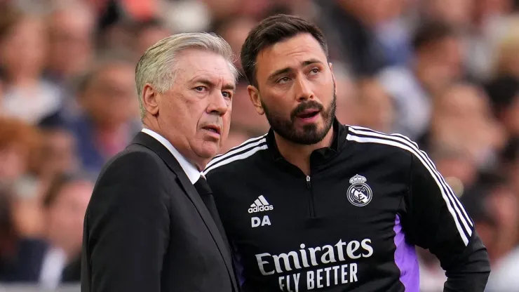 Carlo Ancelotti, Head Coach of Real Madrid, and Davide Ancelotti, Assistant Manager of Real Madrid, look on during the LaLiga Santander match between Valencia CF and Real Madrid CF at Estadio Mestalla on May 21, 2023 in Valencia, Spain.