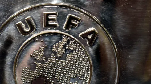 The UEFA logo is seen on the UEFA Champions League trophy as it is prepared for the UEFA 2014/15 Champions League third qualifying rounds draw at the UEFA headquarters, The House of European Football, on July 18, 2014 in Nyon, Switzerland.