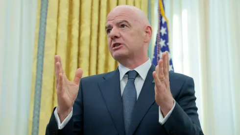 President of Fédération Internationale de Football Association (FIFA) Gianni Infantino speaks alongside U.S. President Donald Trump as he signs an executive order in the Oval Office at the White House.