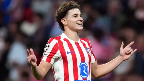 Julian Alvarez of Atletico de Madrid celebrates scoring his team's fifth goal from the penalty spot during the UEFA Champions League 2025/26 League Phase MD2 match between Atletico de Madrid and Eintracht Frankfurt.