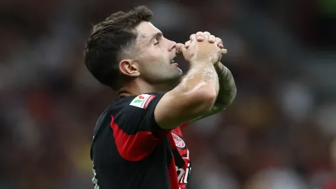Christian Pulisic of AC Milan reacts during the Coppa Italia match between AC Milan and SSC Bari at Stadio San Siro on August 17, 2025 in Milan, Italy.