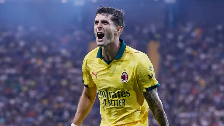 Christian Pulisic of AC Milan celebrates after scoring his team's third goal during the Serie A match between Udinese Calcio and AC Milan at Stadio Friuli on September 20, 2025 in Udine, Italy.