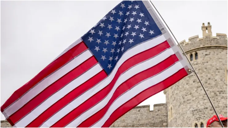 A supporter waves a flag of the United States