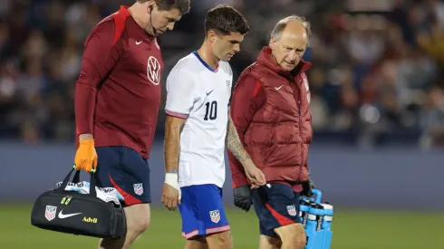 Christian Pulisic of the United States leaves the game after picking up an injury vs Australia.