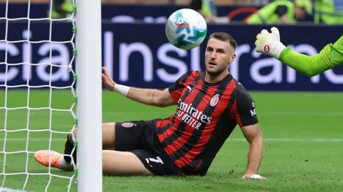 Santiago Gimenez of AC Milan scores