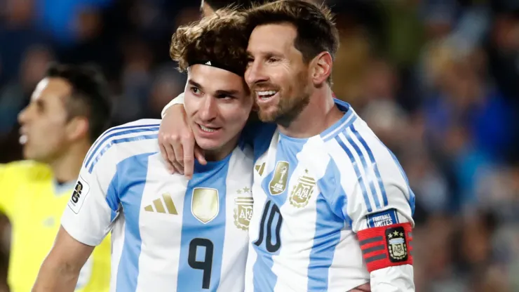 Lionel Messi of Argentina celebrates with teammate Julian Alvarez.