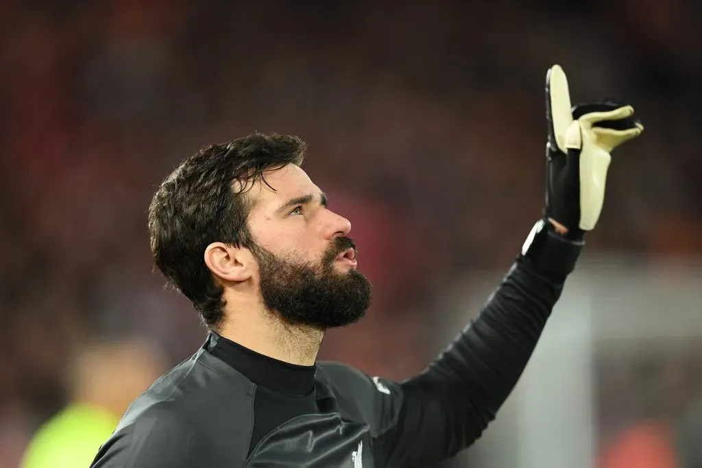 LIVERPOOL, ENGLAND – FEBRUARY 21: Alisson Becker of Liverpool reacts prior to the UEFA Champions League round of 16 leg one match between Liverpool FC and Real Madrid at Anfield on February 21, 2023 in Liverpool, England. (Photo by Michael Regan/Getty Images)