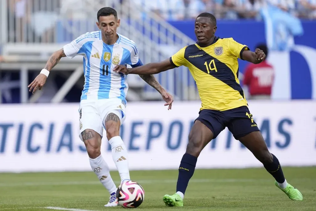 CHICAGO, ILLINOIS – JUNE 09: Angel Di Maria #11 of Argentina scores a goal past Alan Minda #14 of Ecuador in the first half during an International Friendly match at Soldier Field on June 09, 2024 in Chicago, Illinois. (Photo by Patrick McDermott/Getty Images)