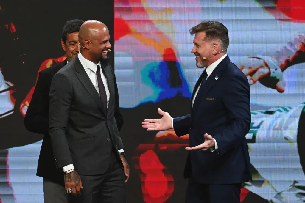 LUQUE, PARAGUAY – MARCH 17: Felipe Melo, Brazilian former player, receives an award from President of CONMEBOL Alejandro Dominguez during the Copa CONMEBOL Libertadores and Sudamericana 2025 draw on March 17, 2025 in Luque, Paraguay. (Photo by Christian Alvarenga/Getty Images)