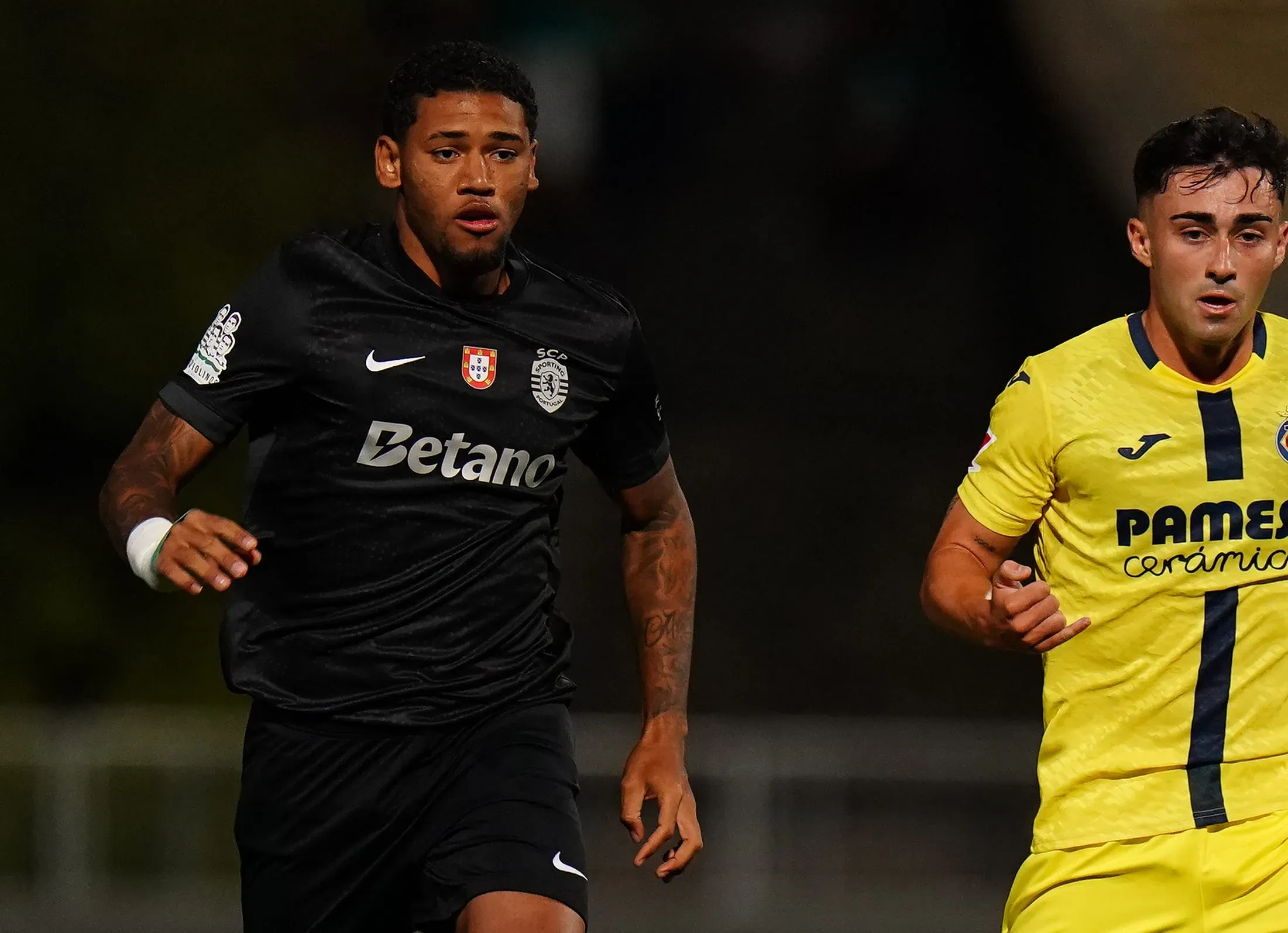 OEIRAS, PORTUGAL – JULY 25: Alberto Moleiro of Villarreal CF with Rayan Lucas of Sporting CP in action during the Pre-Season Friendly match between Sporting CP and Villarreal at Estadio Nacional on July 25, 2025 in Oeiras, Portugal. (Photo by Gualter Fatia/Getty Images)