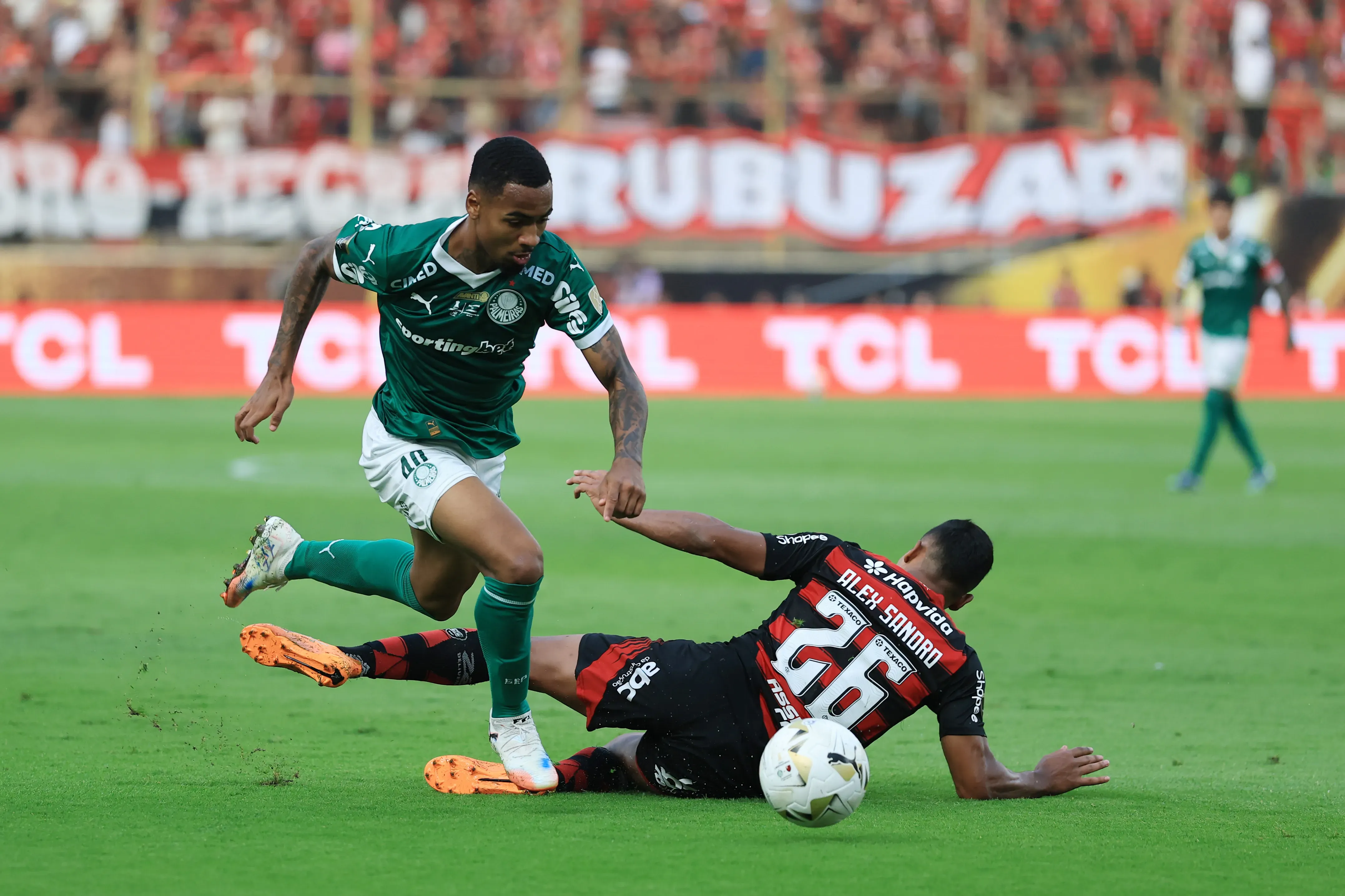LIMA, PERU – NOVEMBER 29: Allan of Palmeiras is challenged by Alex Sandro of Flamengo during the 2025 Copa CONMEBOL Libertadores Final match between Palmeiras and Flamengo at Estadio Monumental on November 29, 2025 in Lima, Peru. (Photo by Buda Mendes/Getty Images)