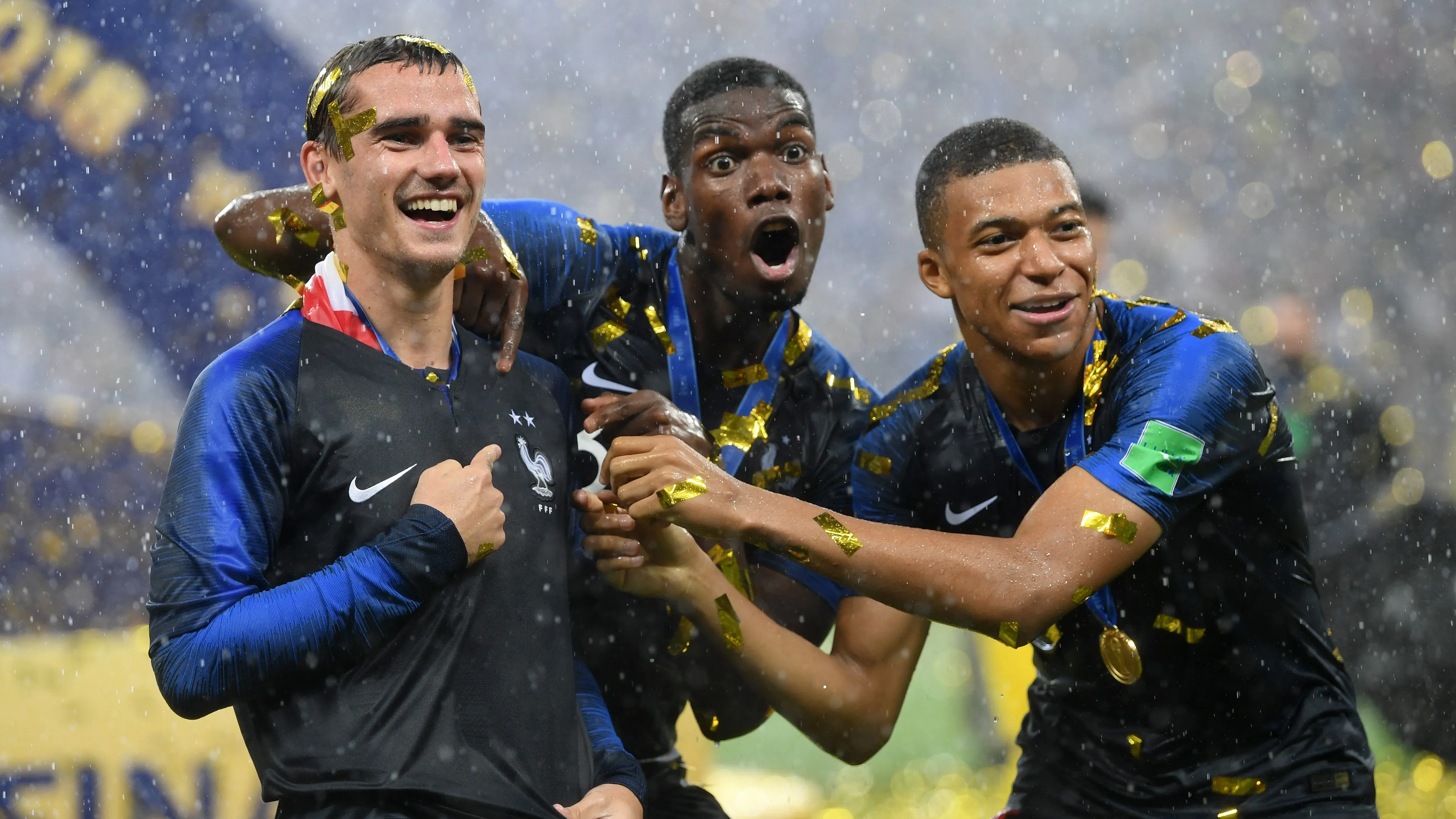 Griezmann, Pogba e Mbappé comemorando a Copa do Mundo de 2018. (Photo by Matthias Hangst/Getty Images)