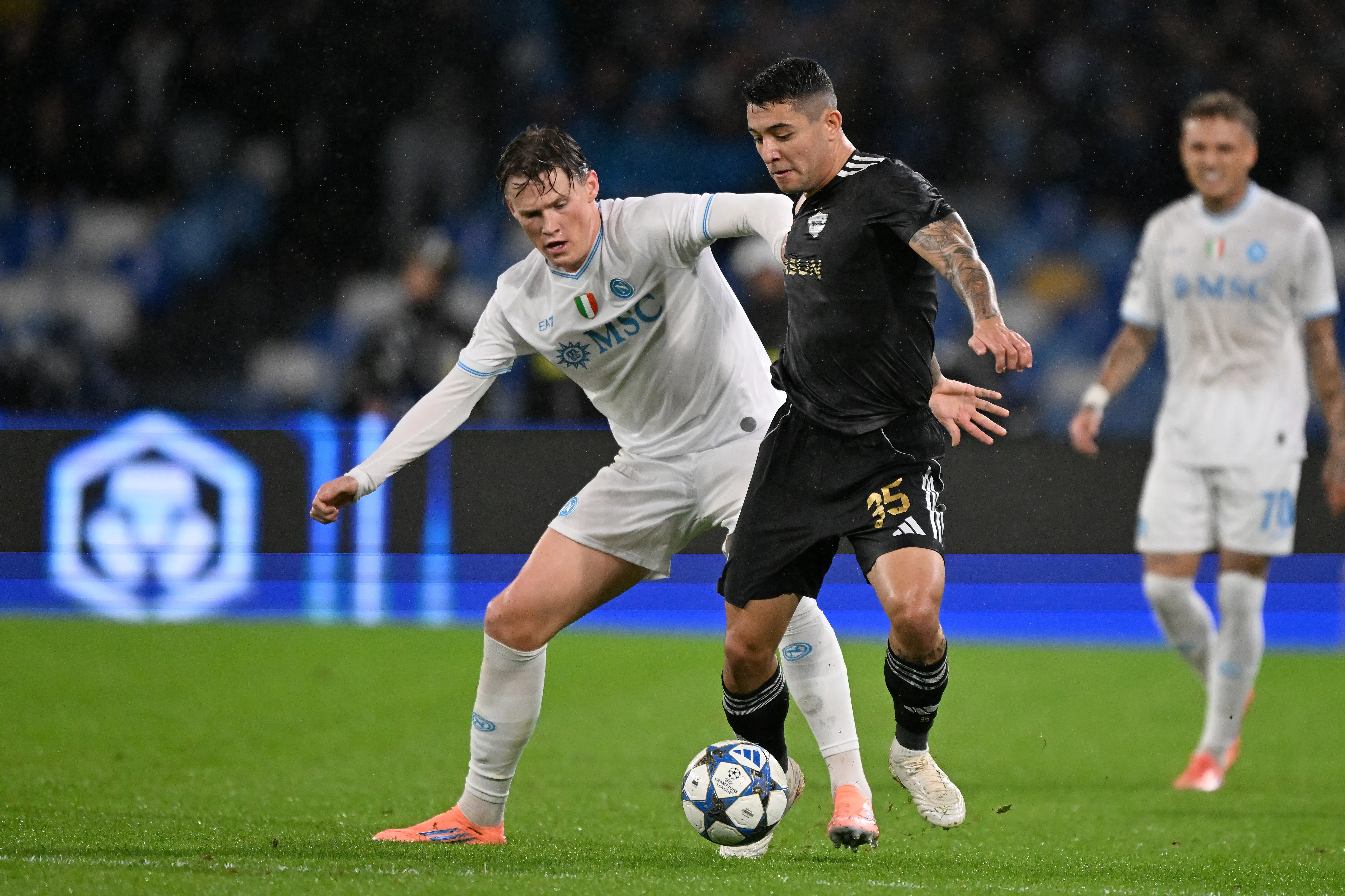 NAPLES, ITALY – NOVEMBER 25: Pedro Bicalho of Quarabag FK battles for possession with Scott McTominay of SSC Napoli during the UEFA Champions League 2025/26 League Phase MD5 match between SSC Napoli and Qarabag FK at Stadio Diego Armando Maradona on November 25, 2025 in Naples, Italy. (Photo by Francesco Pecoraro/Getty Images)