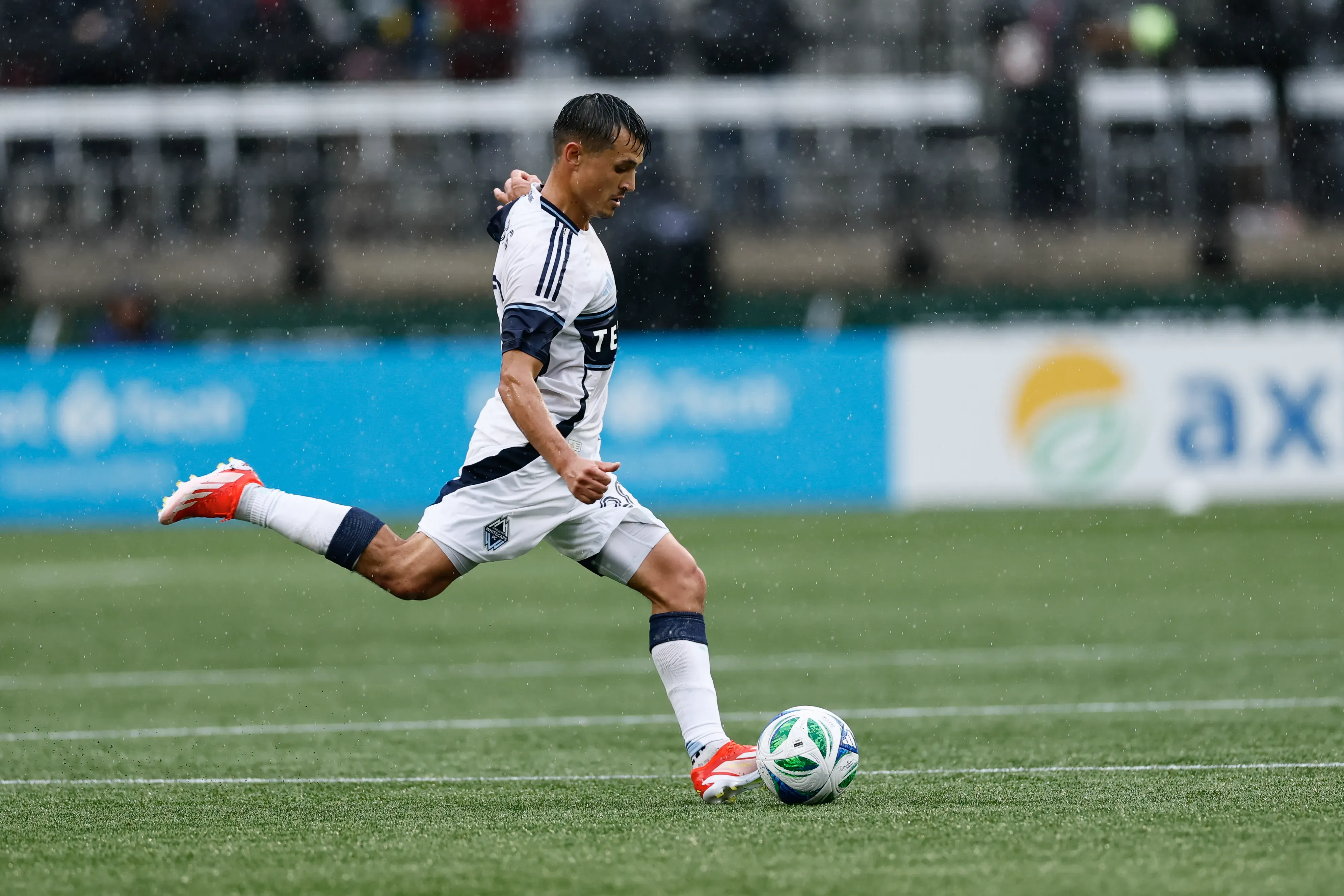 Andrés Cubas #20 of Vancouver Whitecaps kicks the ball during the first half of the game against the Portland Timbers at Providence Park on February 23, 2025 in Portland, Oregon. The Vancouver Whitecaps won 4-1. (Photo by Alika Jenner/Getty Images)