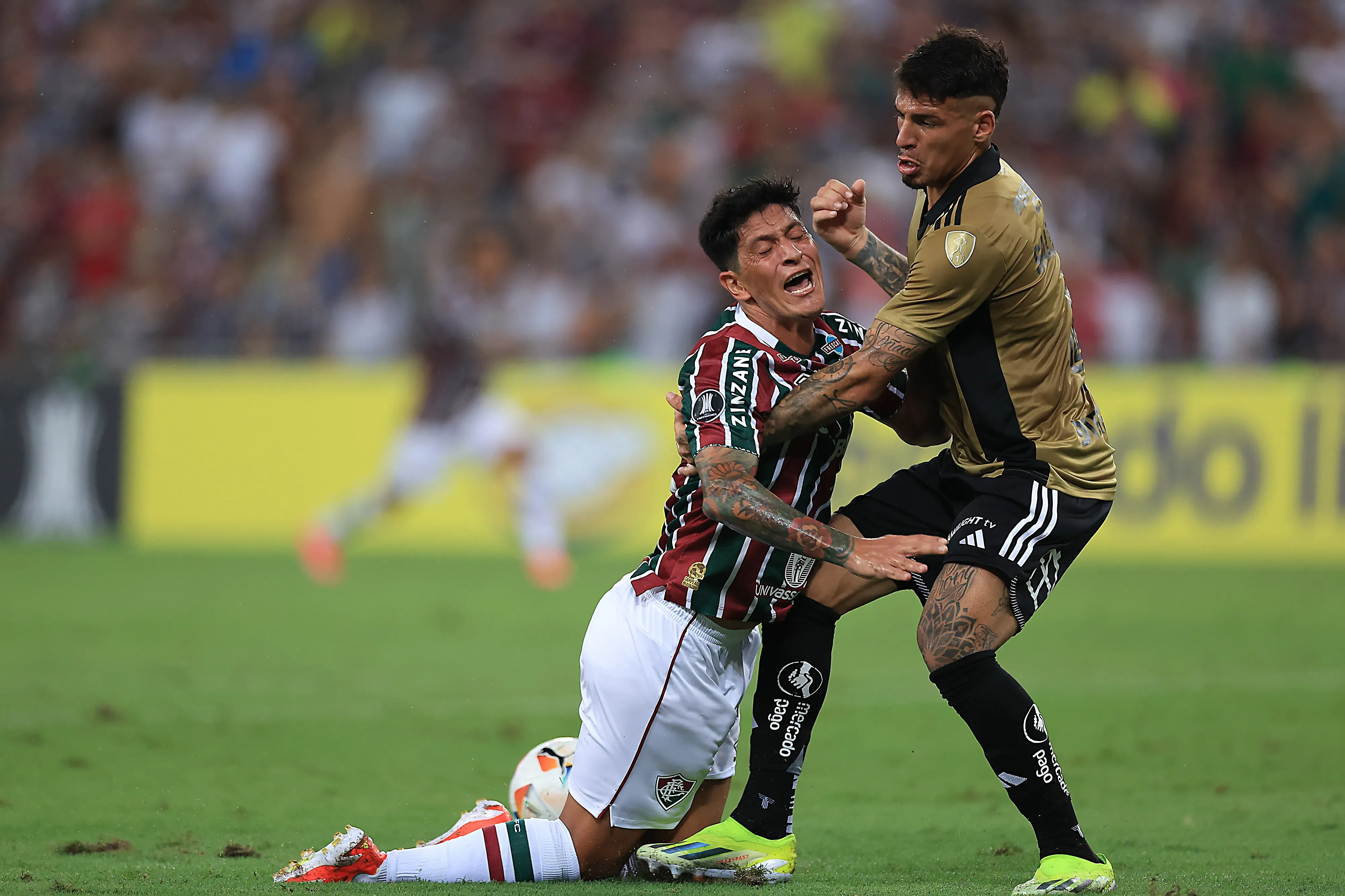 RIO DE JANEIRO, BRAZIL – APRIL 09: Germán Cano of Fluminense battles for the ball with Alan Saldivia of Colo-Colo during the Copa CONMEBOL Libertadores 2024 group A match between Fluminense and Colo-Colo at Maracana Stadium on April 09, 2024 in Rio de Janeiro, Brazil. (Photo by Buda Mendes/Getty Images)