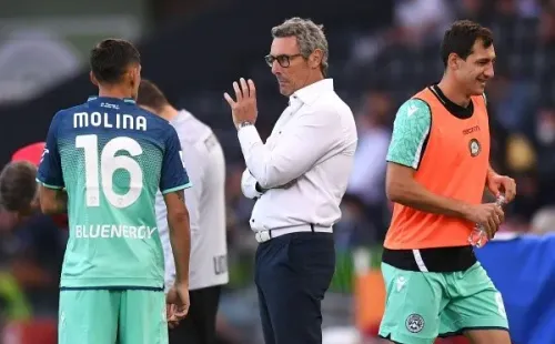 Charla entre Molina yGotti, su DT. Foto: Getty