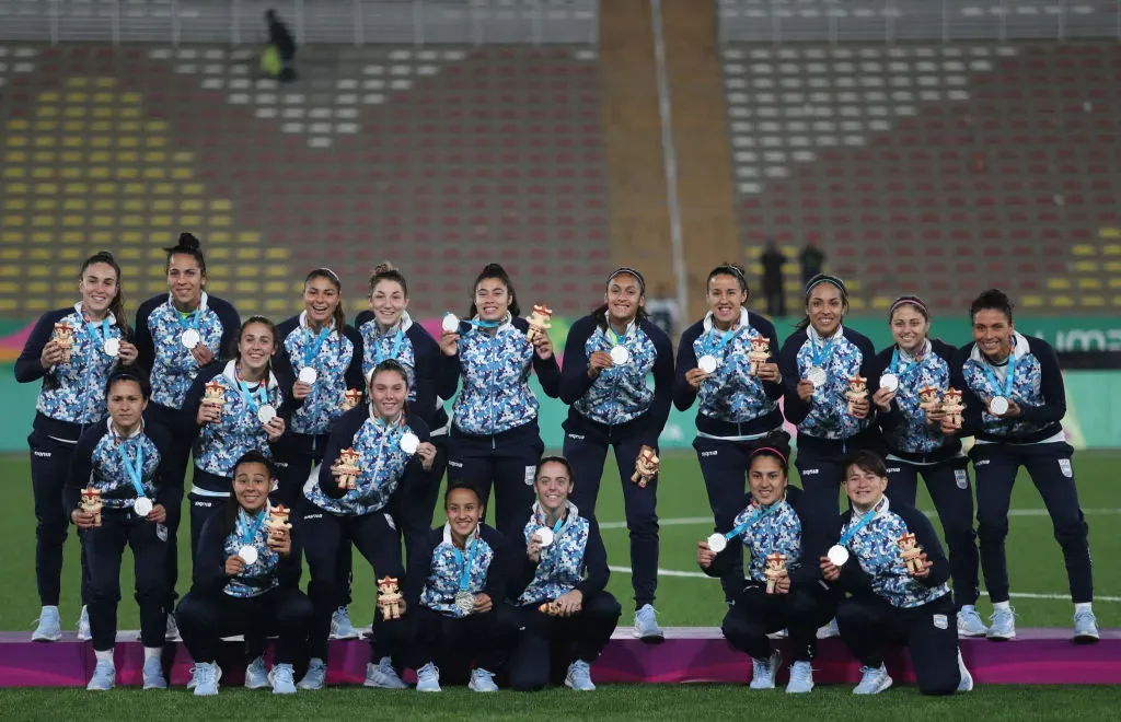 LIMA, PERU – AUGUST 09: Players of Argentina celebrate in the podium of Women’s Football on Day 14 of Lima 2019 Pan American Games at San Marcos Stadium on August 9, 2019 in Lima, Peru. (Photo by Raul Sifuentes/Getty Images)