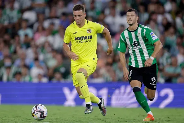 Lo Celso y Guido Rodríguez se han enfrentado en La Liga de España.