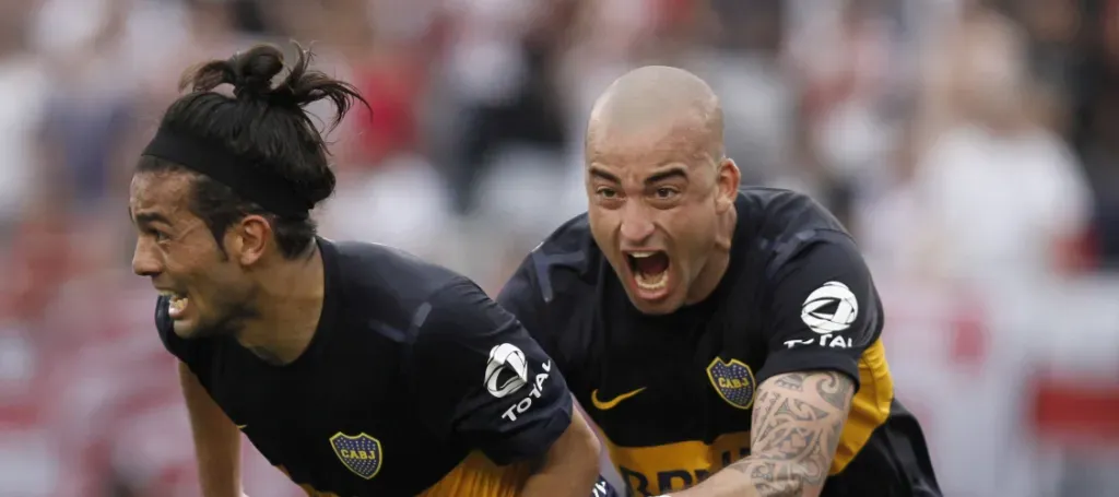 Erviti y Silva, autores de los goles del Superclásico del Torneo Inicial 2012 que terminó 2 a 2. (Foto: Getty).